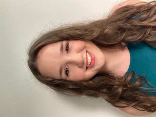 Headshot of Ms. Morrison smiling at the camera